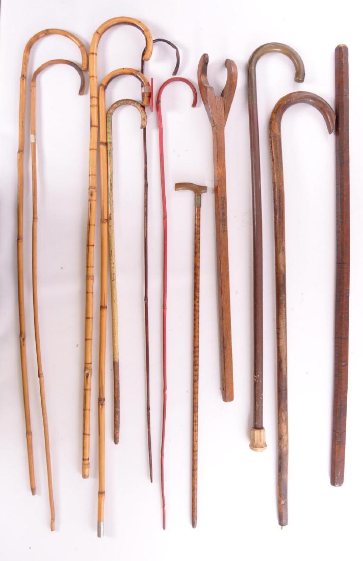 Group of Antique Walking Canes: Includes Circus 1947, Pick R Stick, American Legion, and Others. Tallest 36 inches