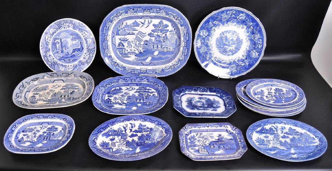 Group of 15 "Willow Ware" Serving Platters and Plates: Includes Olde Willow Alfred Meakin, England; Japan, and more. Largest 17 1/2 x 14 inches. Some Hairline Cracks