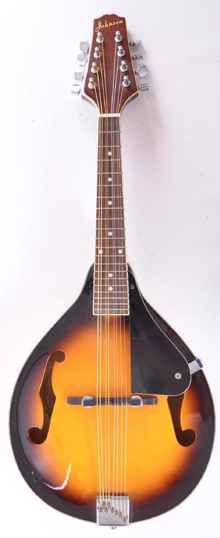 Johnson A-Model MA-100 Mandolin: 27 x 10 1/2 inches