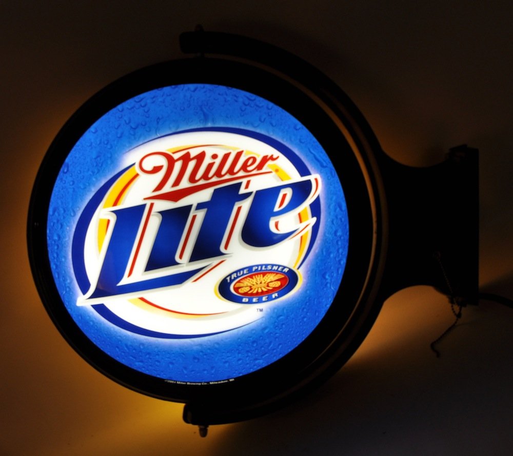 Miller Lite Advertising Light Up Rotating Pub Sign New: New and in Working Condition, 26 x 24 x 11 1/2 inches
