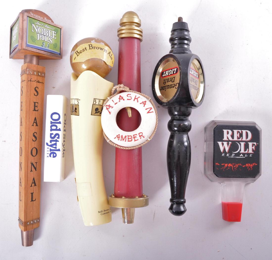Group of 6 Advertising Beer Tappers: Includes Red Wolf, Alaskan Amber, Bells, Old Style, and Noble Pills. Largest 13 1/2 inches
