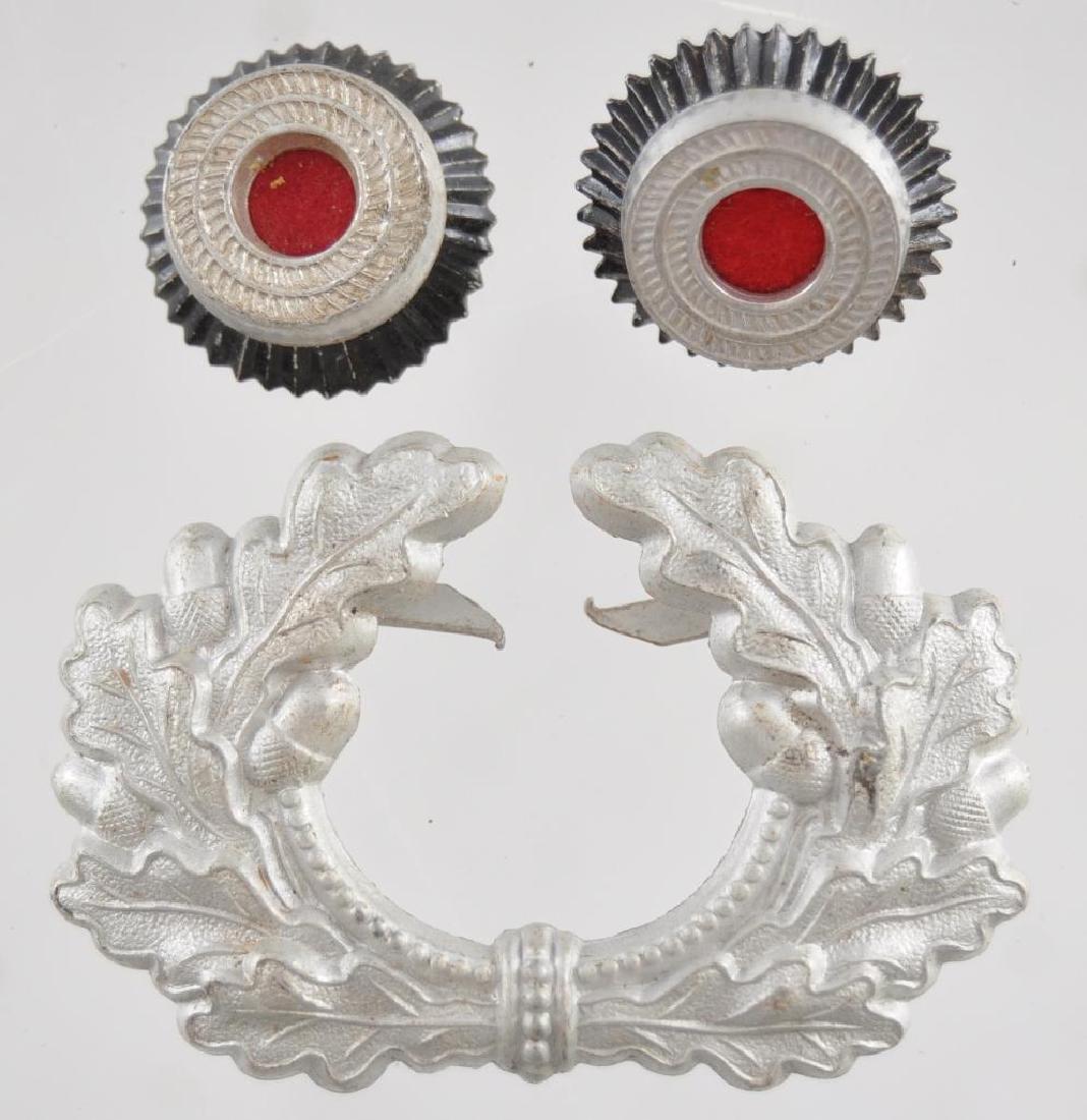 Group of WW2 German Cap Devices: Largest 2 3/8 x 1 1/2 inches