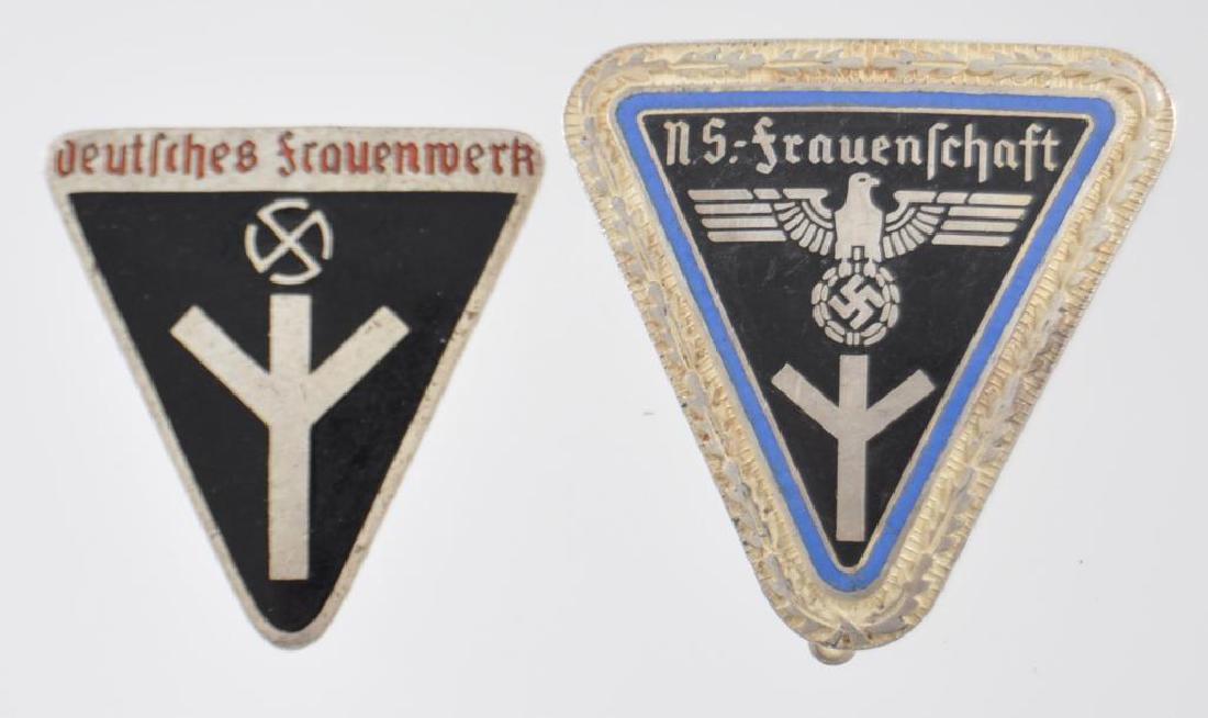 Group of 2 WW2 German Woman s NS frauenschaft Badge: Measures 1 3/8 wide by 1 7/16 tall. The front reads NS frauenschaft . There is a German eagle in the center with the emblem at the base. The reverse side is maker marked RZM M1/27 . This is the versio