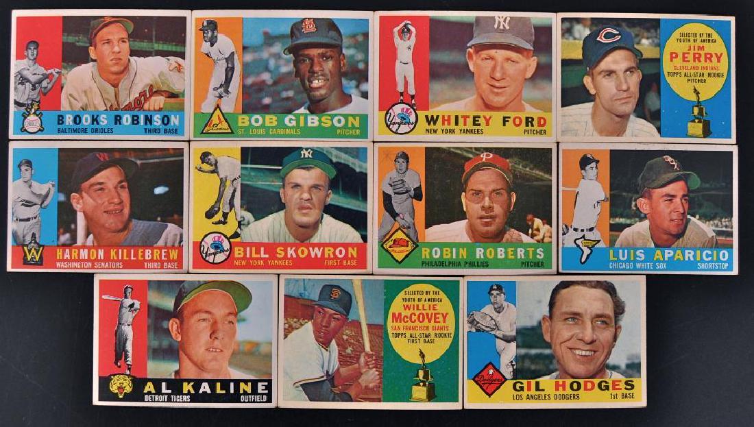 Group of 11 1960 Topps Baseball Cards: Includes Bob Gibson, Jim Perry, Whitey Ford, Brooks Robinson, Luis Aparicio, Robin Roberts, Harmon Killebrew, Bill Skowron, Gil Hodges, Al Kaline, and Willie McCovey.
