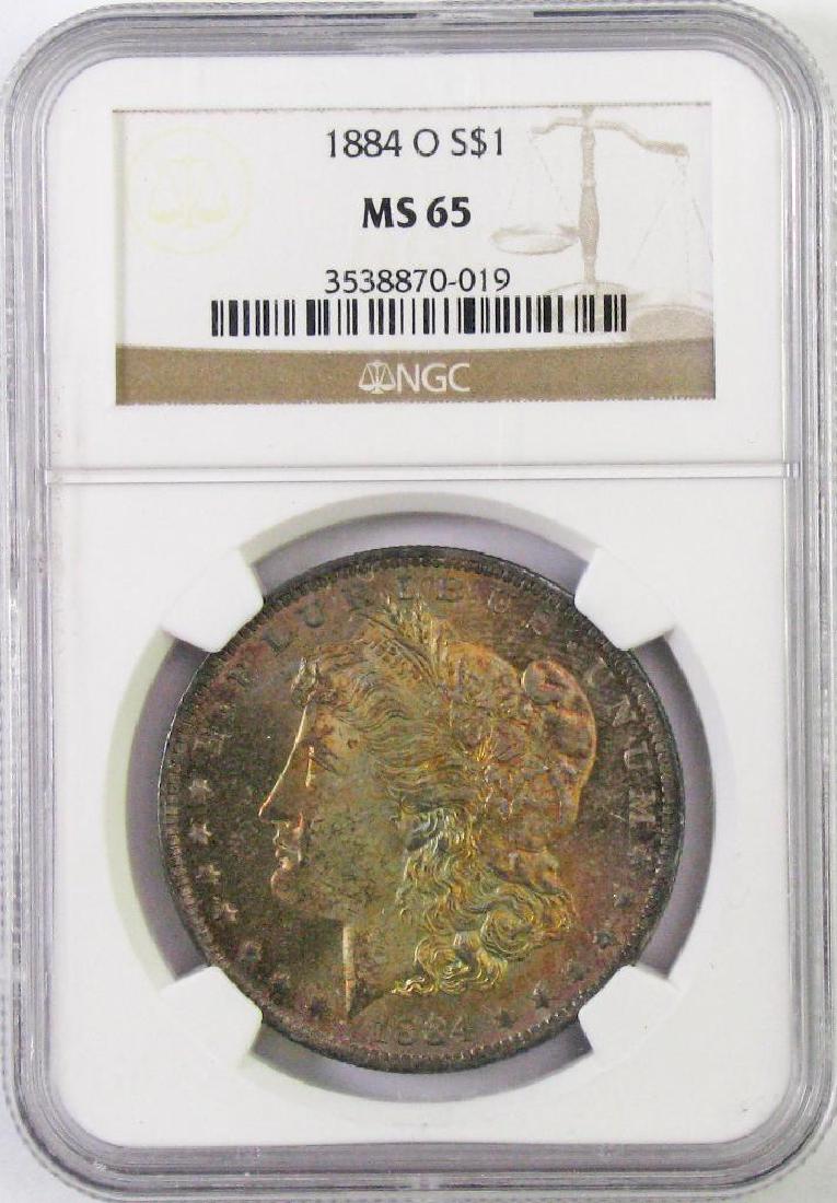 1884 O Morgan Silver Dollar (NGC) MS65. (1 of 4)