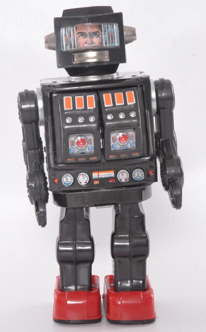 Japanese Tin Battery Powered Robot: Working Condition, Right Arm has been Damaged and Repaired, 11 1/2 x 6 inches