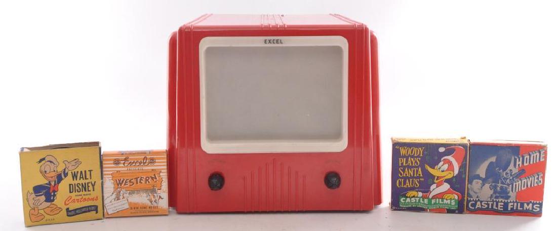 Vintage Excel Movie Projector with 4 Movies: Turns on and plays movies but needs a brighter bulb. Includes Home Movies, Woody Plays Santa Claus, Westerns, and Walt Disney