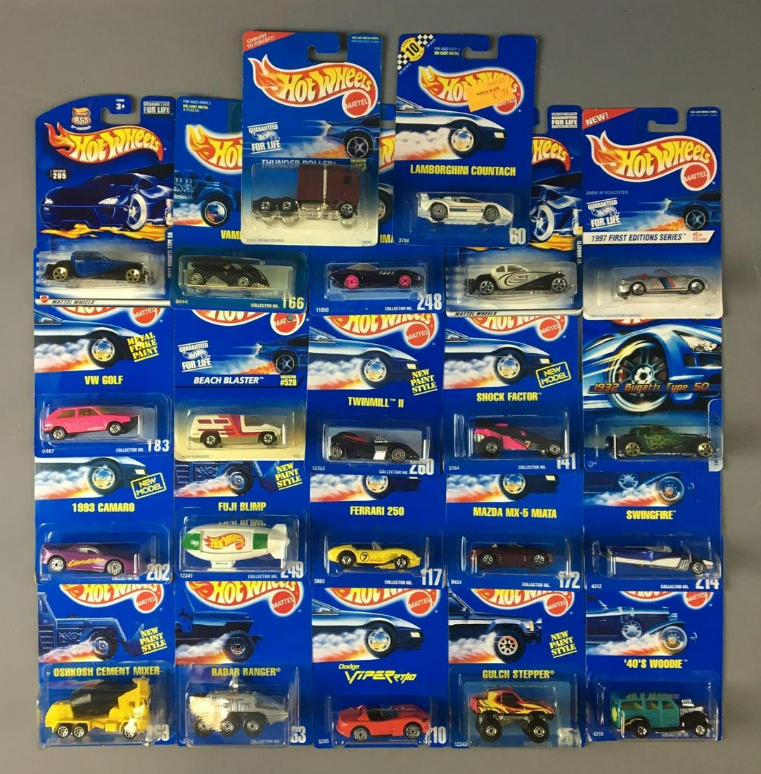 Group of 22 Hot Wheels Die-Cast Vehicles In Original: By Mattel, includes Dodge Viper, Fuji Blimp, VW Golf, Shock Factor, Vampyra, 40s Woodie and more