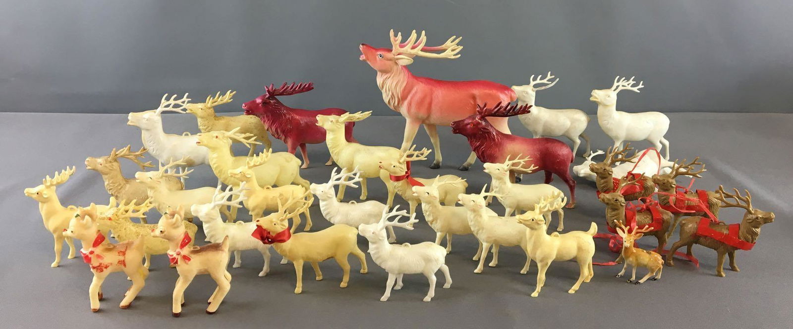 Group of Vintage Plastic/Celluloid Christmas Reindeer: 1 has broken leg, 3 are missing 1 antler