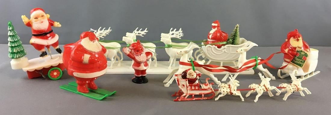 Group of Vintage Plastic/Celluloid Christmas Decor: Includes Candy fill Santas, windup santa and more