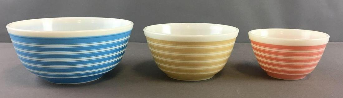 Group of 3 Vintage Stacking Striped Pyrex Nesting Bowls: Blue, tan and pink, Largest is 8 1/2 inch diameter 4 inches tall