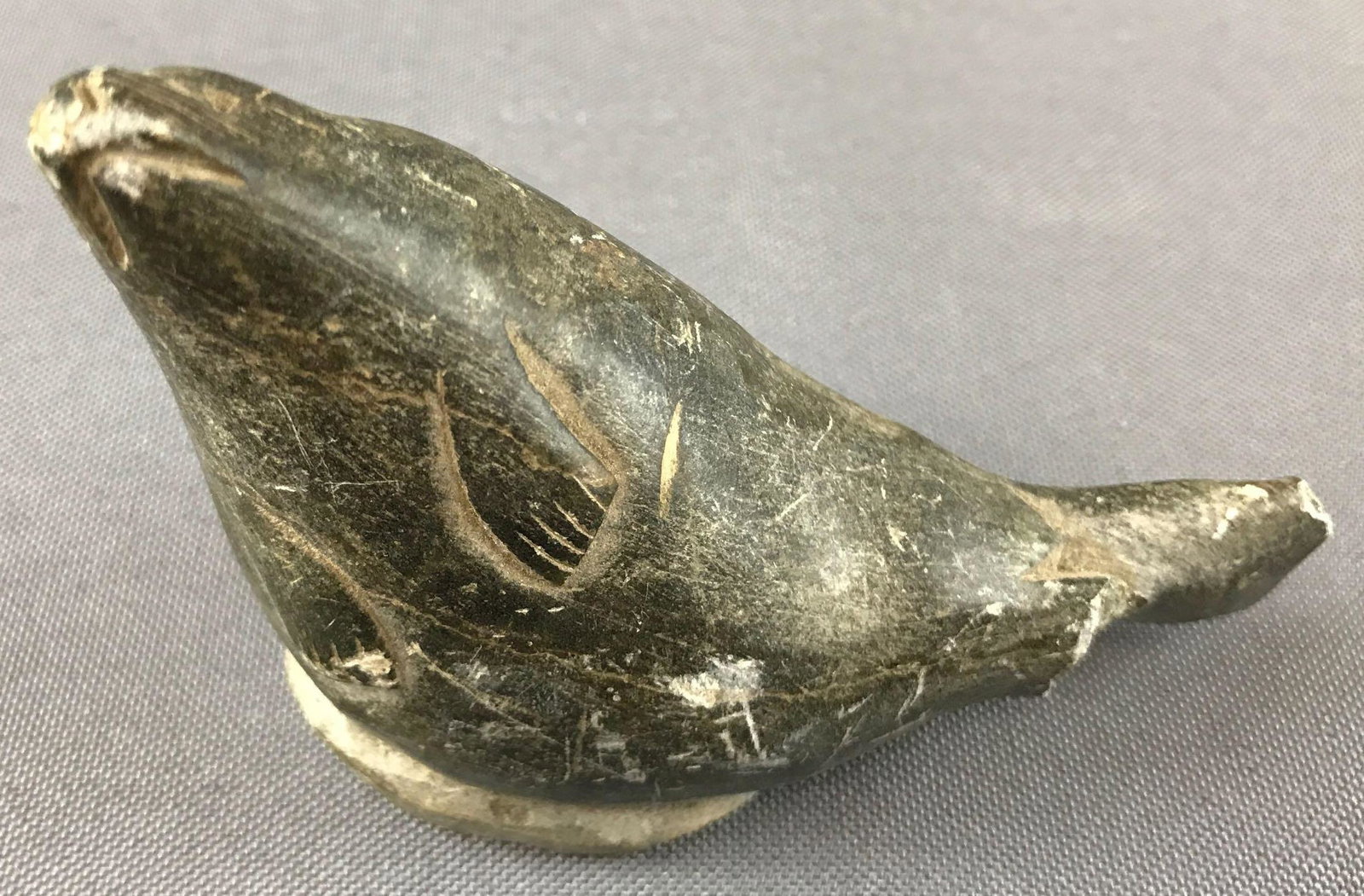 Inuit Eskimo Sea Lion Soapstone carving: Some damage, signed. 4 inches long