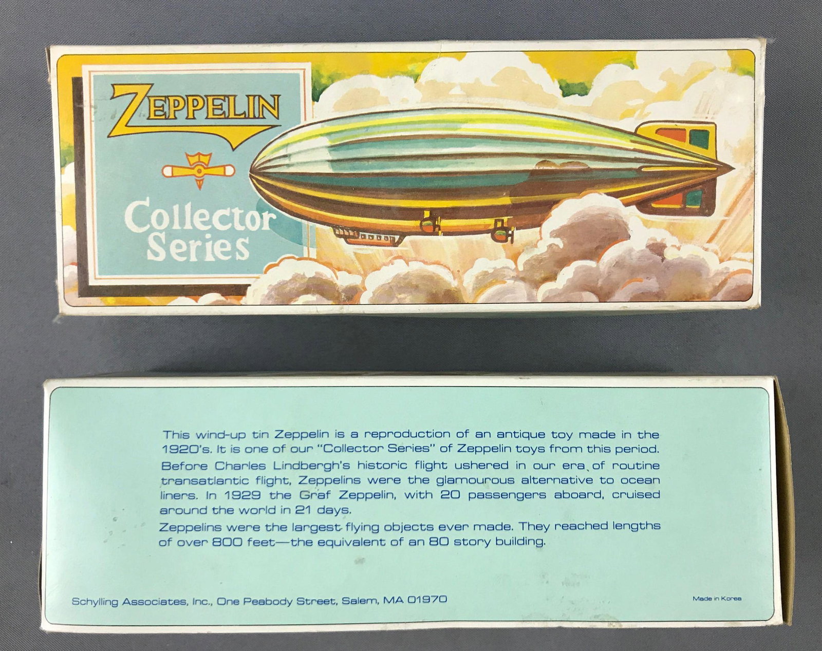 Group of 2 Vintage Zeppelin wind up toys in original: all for one money