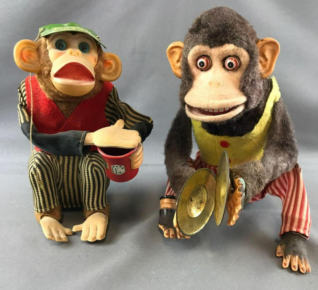 Set of 2 vintage battery powered monkeys: Cragstan Crap Shooting Monkey, monkey with cymbals