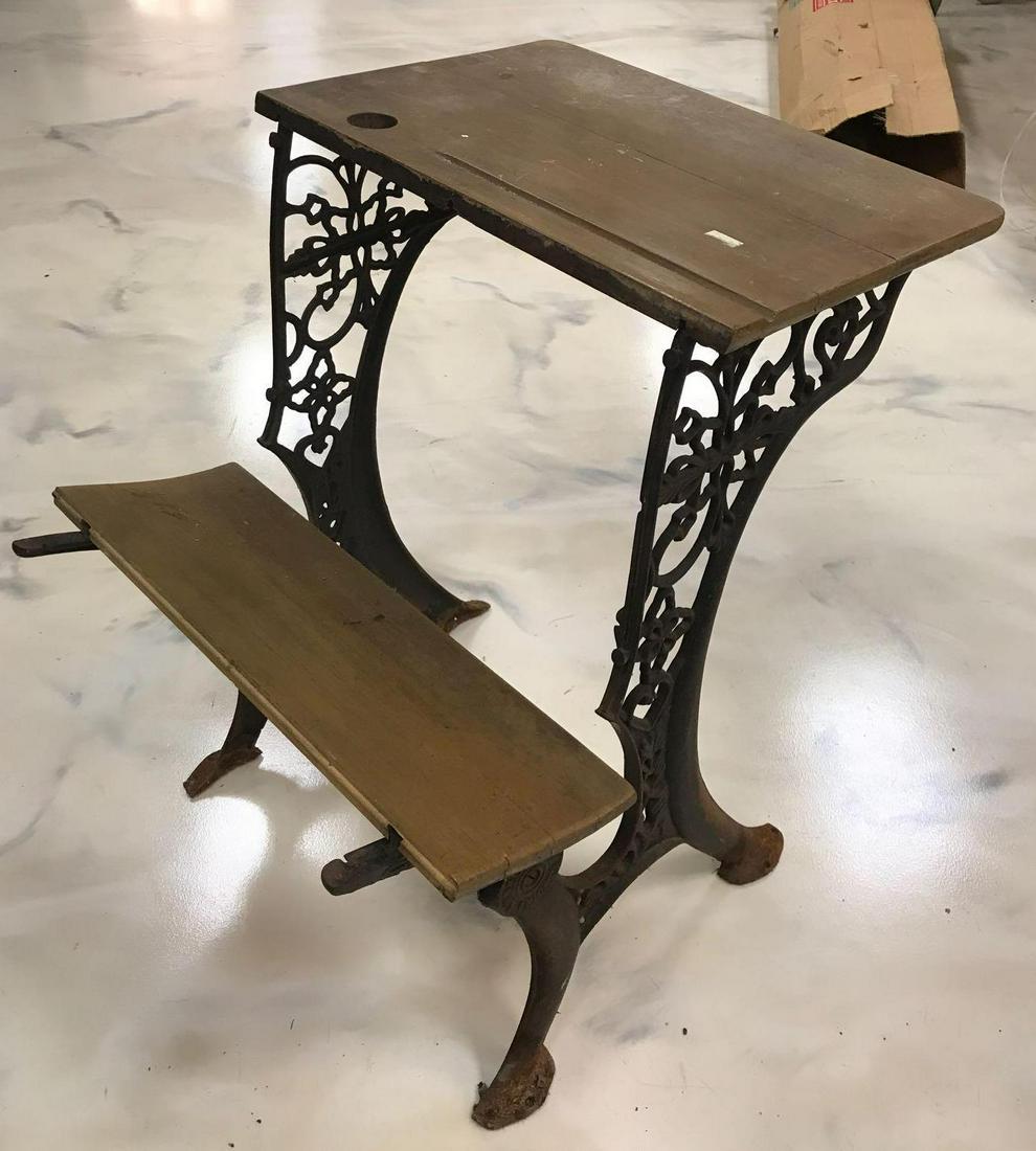 Antique wooden school desk: Cast iron base. No shipping available. 23 x 30 x 22