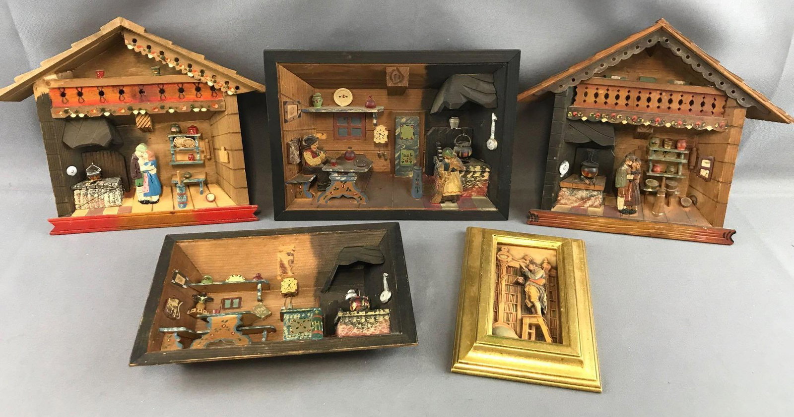 Group of 5 Italian wooden wall hangings: 4 shadow box style pieces, 1 ANRI framed wood carving of Carl Spitzweg
