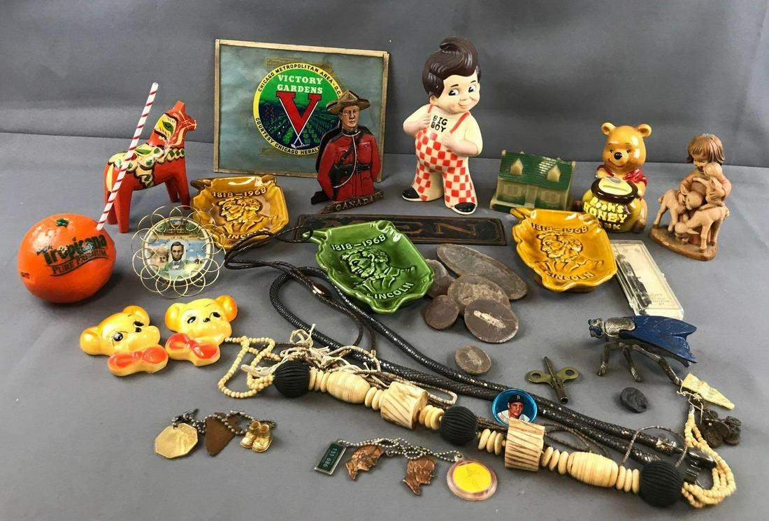 Mixed lot of vintage items: Figurines, banks, buttons, jewelry, souvenir keychains, fossil specimens and more