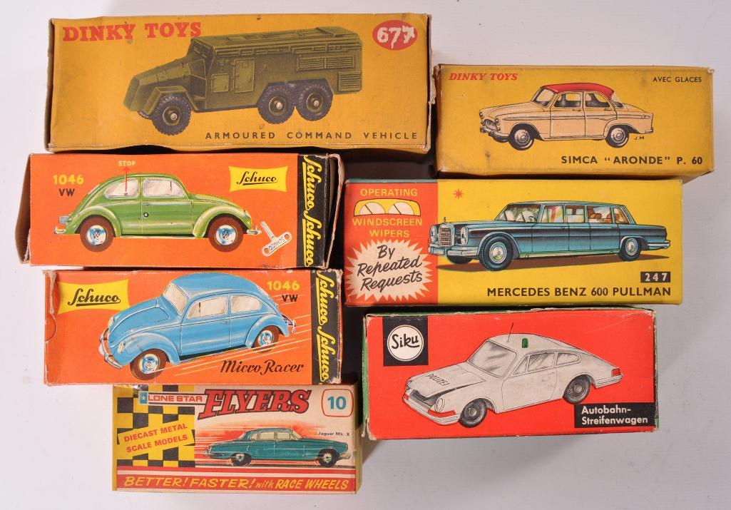 Group of 7 Empty Die-Cast Toy Vehicle Boxes: Includes Corgi, Dinky, Lone Star, Schuco, and Siku. Empty Boxes