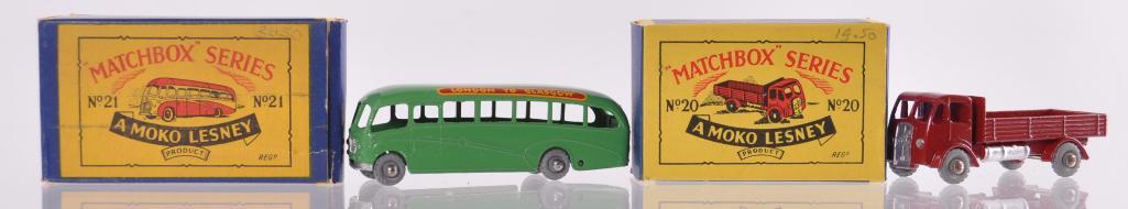 Group of 2 Matchbox Die-Cast Vehicles with Original: Includes No. 21 Bedford Duple Luxury Coach with Light Green Body, "London to Glasgow" Decal, and Metal Wheels, No. 20 Stake Truck with Red Body and Metal Wheels. D Moko Box, A Moko Lesney Product, Mad