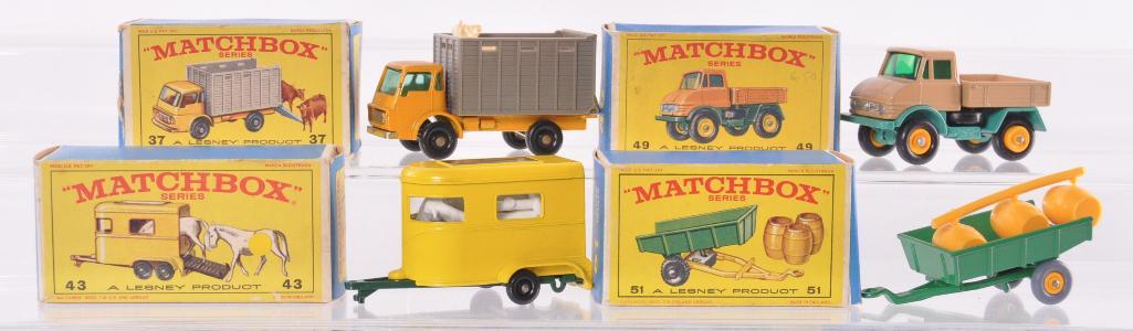Group of 4 Matchbox Die-Cast Vehicles with Original: Includes No. 43 Pony Trailer, No. 51 Tipping Trailer, No. 37 Cattle Truck, and No. 49 Unimog. A Lesney Product Made in England, E Boxes