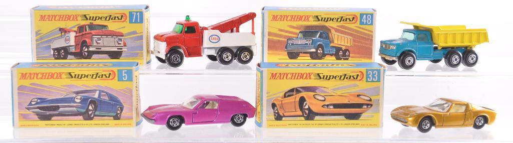 Group of 4 Matchbox Superfast Die-Cast Vehicles with: Includes No. 5 Lotus Europa, No. 71 Wreck Truck, No. 33 Lamborghini Miura P400, and No. 48 Dodge Dumper Truck. A Lesney Product Made in England, Like New Condition, G Boxes