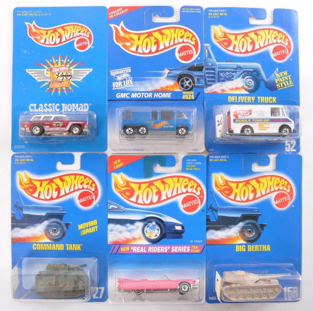 Group of 6 Hot Wheels Die-Cast Vehicles in Original: Includes Big Bertha, Command Tank, Classic Nomad, and More. New in Original Packaging