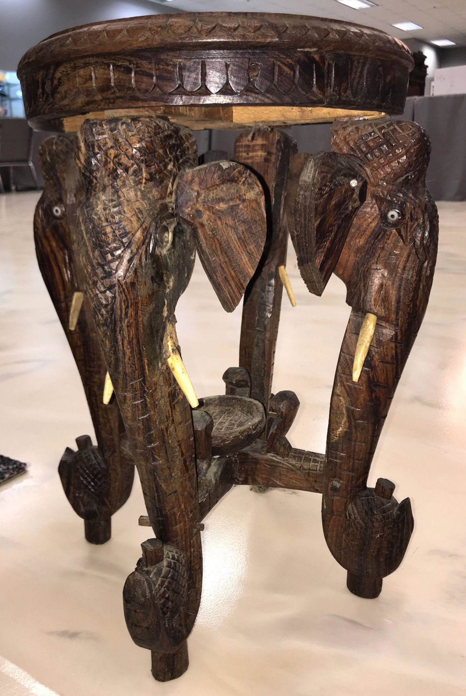 Antique Ornate Elephant Side Table: Carved wooden table with inlay on top. Heavyweight, some wear, cracks. 14x18.ÊShipping is not available for this lot, pick-up only at our Gallery in Ottawa