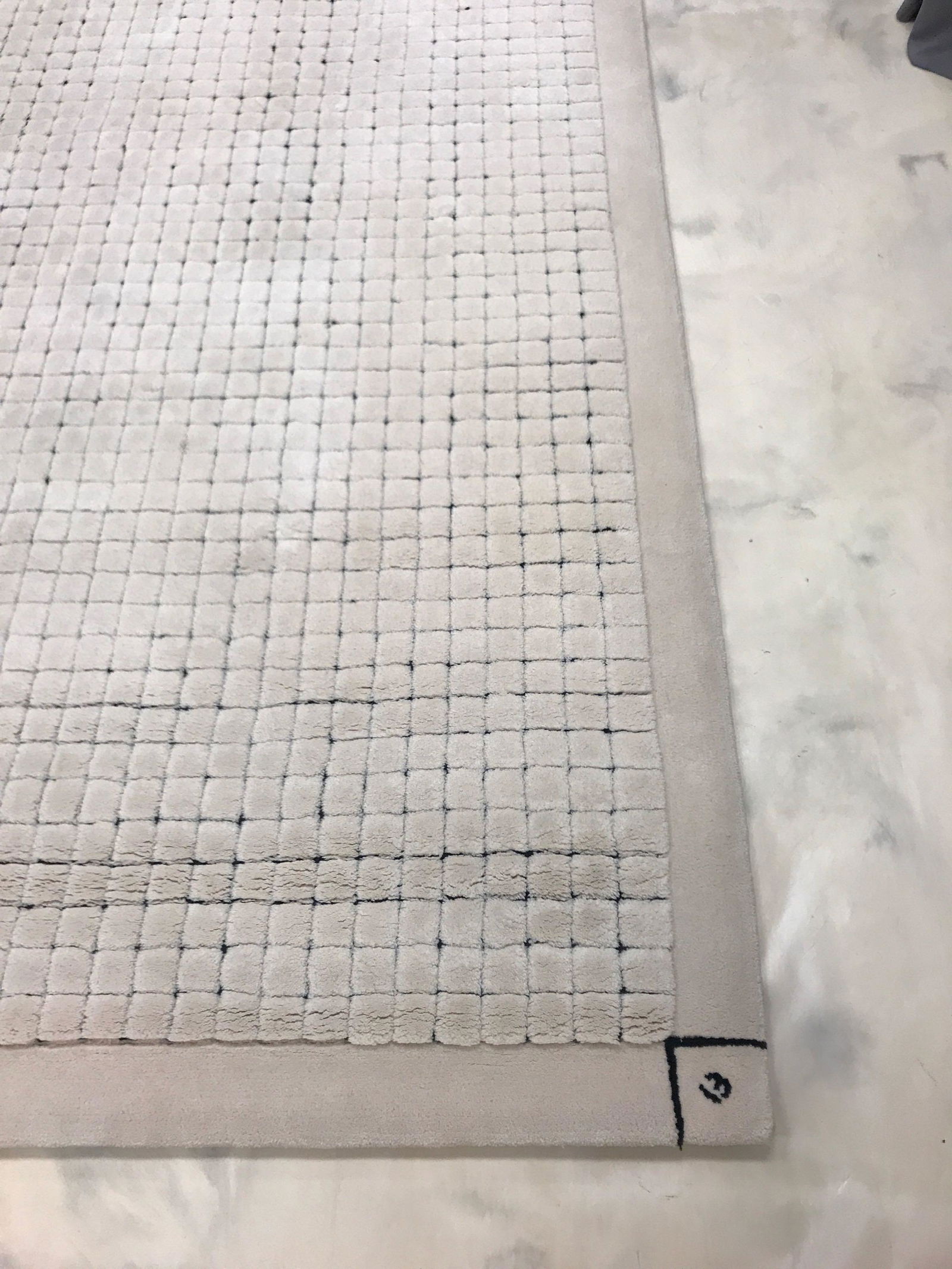 Edward Fields Custom Made Area Rug: Lucky number 13 in one of the corners. Approximately 12x12 feet.ÊShipping is not available for this lot, pick-up only at our Gallery in Ottawa