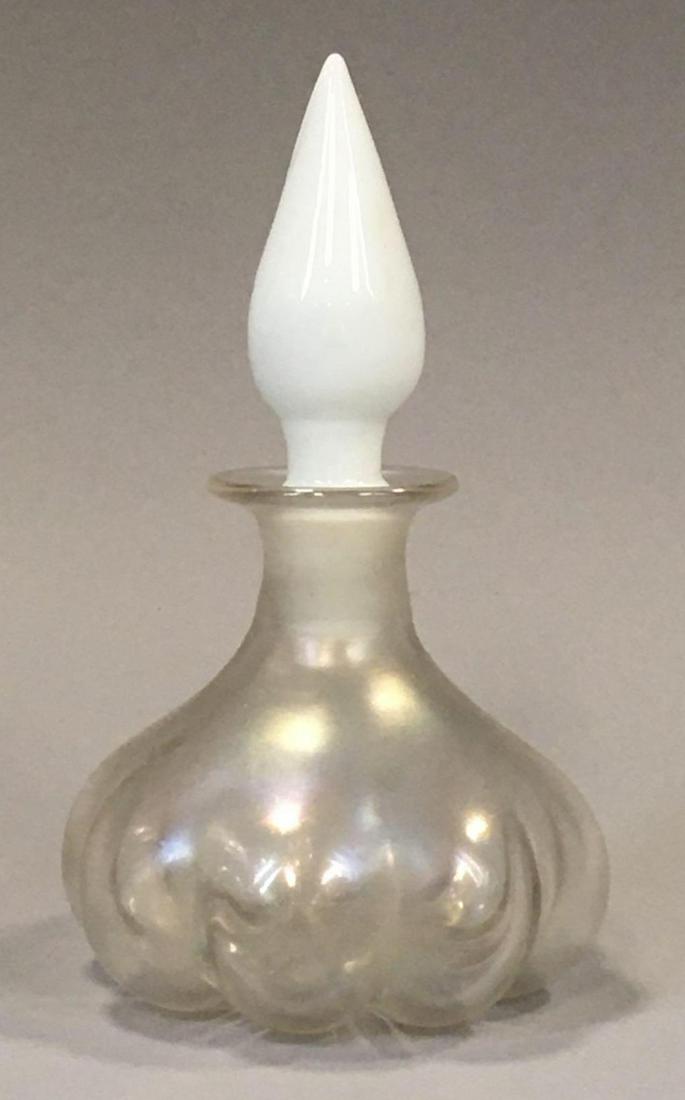 Steuben "Verre de Soie" Melon Ribbed Cologne w/: Steuben "Verre de Soie" Melon Form Cologne w/ Alabaster Flame Stopper (Carder design #447) measures 4-7/8 inches; displays a polished base; and is in excellent condition, without chips or flaws