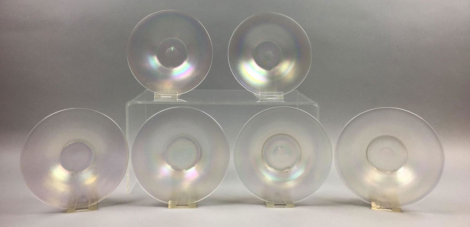 Lot of 6 : Steuben "Verre de Soie" Underplates: Each of these Steuben "Verre de Soie" underplates measure 1-3/4 x 5-3/4 inches; have a ground and polished pontil; and are in excellent condition, without chips or flaws