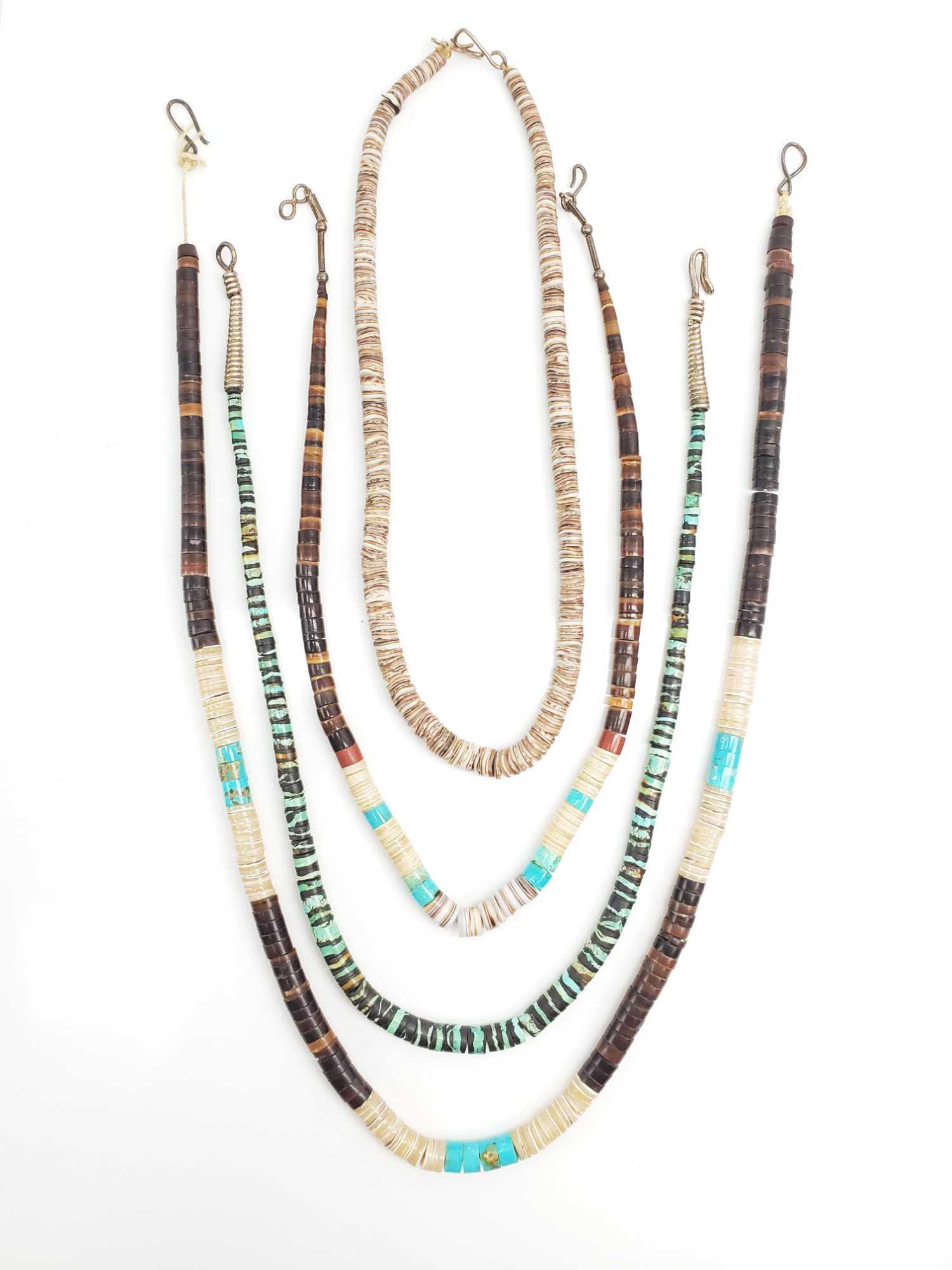 Lot of 4 : Puka Shell Necklaces: Natural shades of Aqua Blue, Green and Brown. Longest 21 inches; shortest 15 inches. Each closes with a single hook clasp