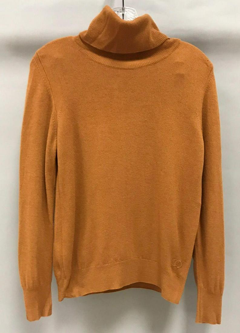 Vintage Gucci Women's Cashmere Burnt Orange Turtleneck: Size 44. measurements approximate shoulder 15, outside sleeve 24, inside 17, bust 36