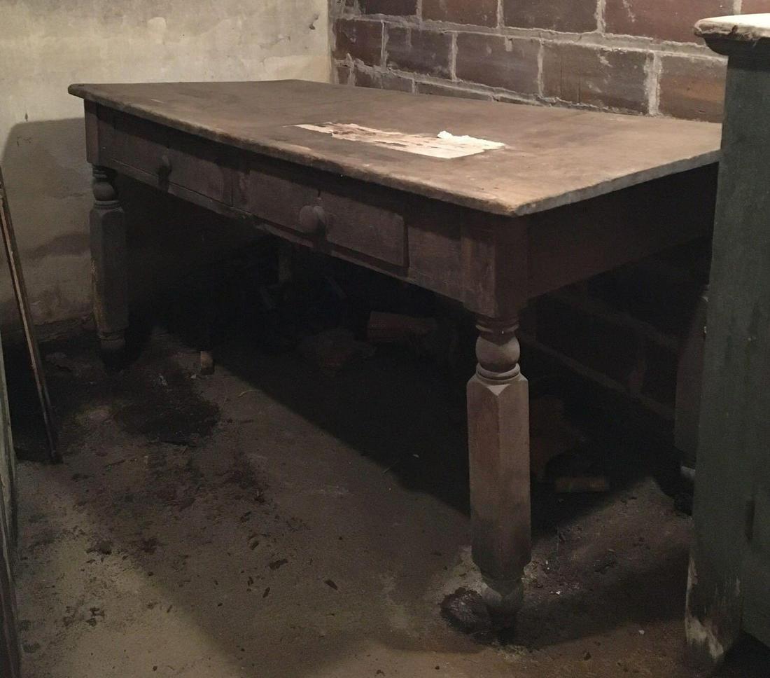 Primitive Antique Wooden Table with 2 Drawers: 55 x 25 x 27 1/2 inches, pickup only no shipping available bring help. Table is in the basement