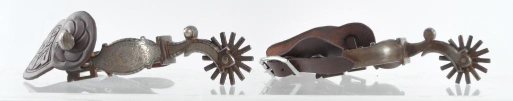 Antique Western Cowboy E. Garcia Silver Inlay Spurs: Marked E. Garcia on the inside of spurs, Heel Width 3 inches, Total Measurement 3 1/4 x 7 x 2 1/2 inches