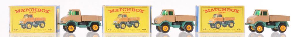Group of 3 Matchbox No. 49 Unimog Die-Cast Vehicles: All Have Tan and Real Bodies with Yellow Hubs, E Boxes, Like New Condition, A Lesney Product, Made in England