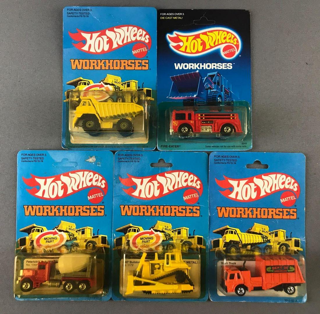 Group of 5 Hot Wheels Workhorses Die-Cast Vehicles in: Includes No. 1169 Peterbilt Cement Mixer, No. 1172 CAT Bulldozer, No. 3912 Trash Truck, No. 9640 Fire-Eater, and No. 1171 CAT Dump Truck