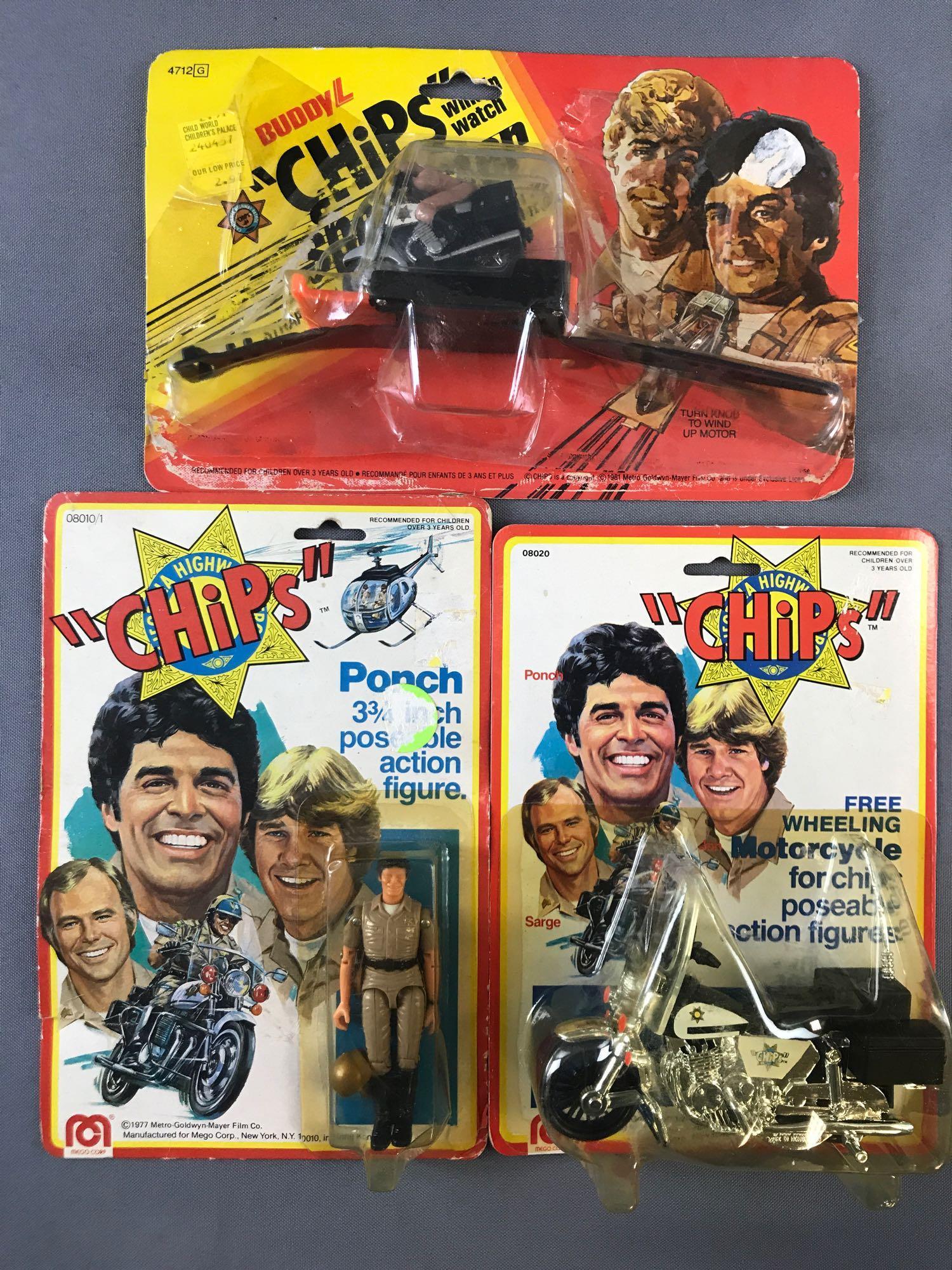 Group of 3 CHiPs Collectibles in Original Packaging: Includes Ponch 3.75 inch poseable action figure, Free Wheeling Motorcycle for CHiPs poseable action figure, and CHiPs Speedster Wrist Watch