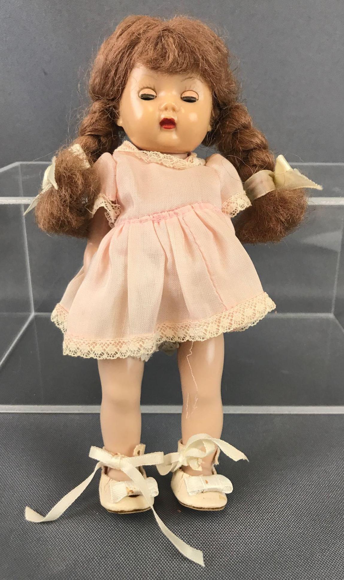 Vintage 1953 Storybook Doll: Muffie. 7.25 inches. All hard plastic. Stuck sleepy eyes
