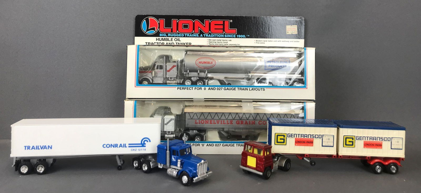 Group of 4 Lionel die-cast Tractor Trailers (1 of 2)