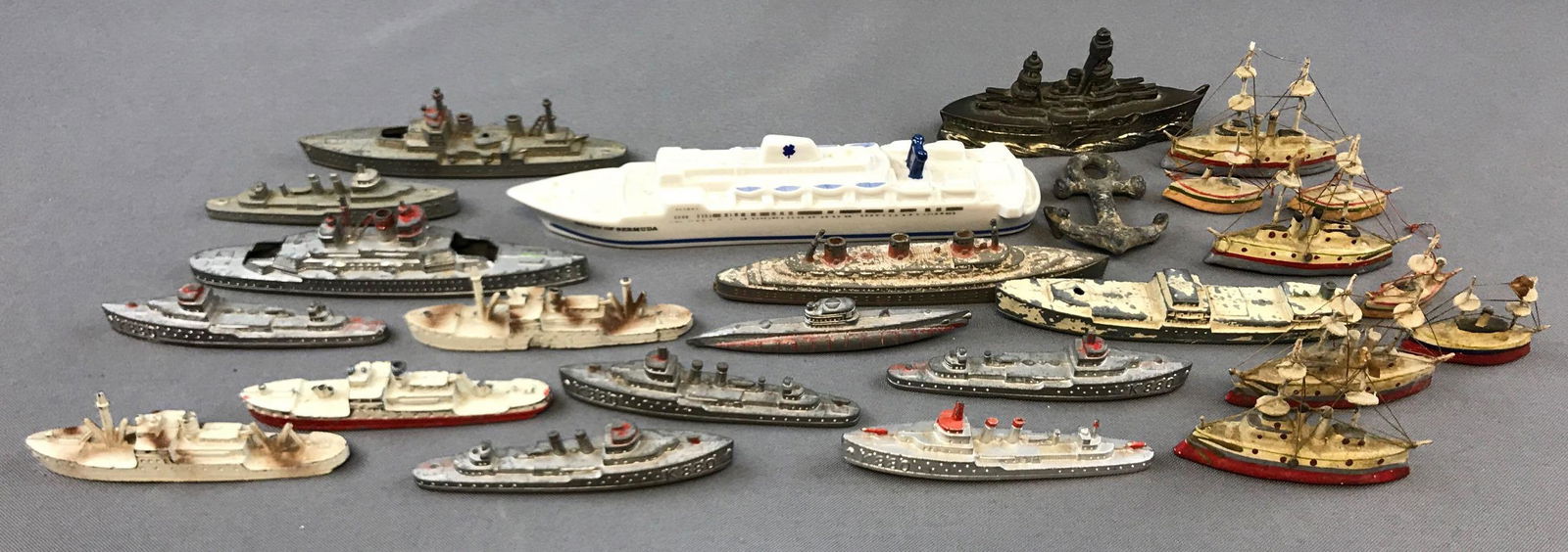 Group of 20+ Vintage Die Cast Ships and more: Some die cast metal, some composition. Many made by Tootsietoys. Some wear and damage from age.