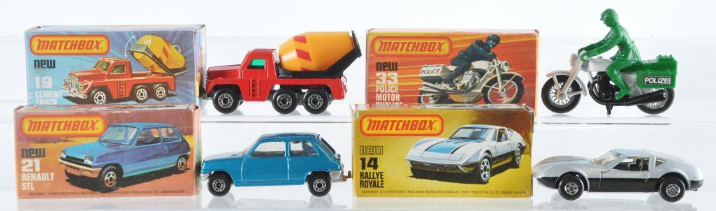 Group of 4 Matchbox Superfast Die-Cast Vehicles with: Includes NO. 21 Renault 5TL, No. 19 Cement Truck, No. 14 Rallye Royale, and No. 33 Police Motor Cyclist with Green Driver, A Lesney Product, Made in England