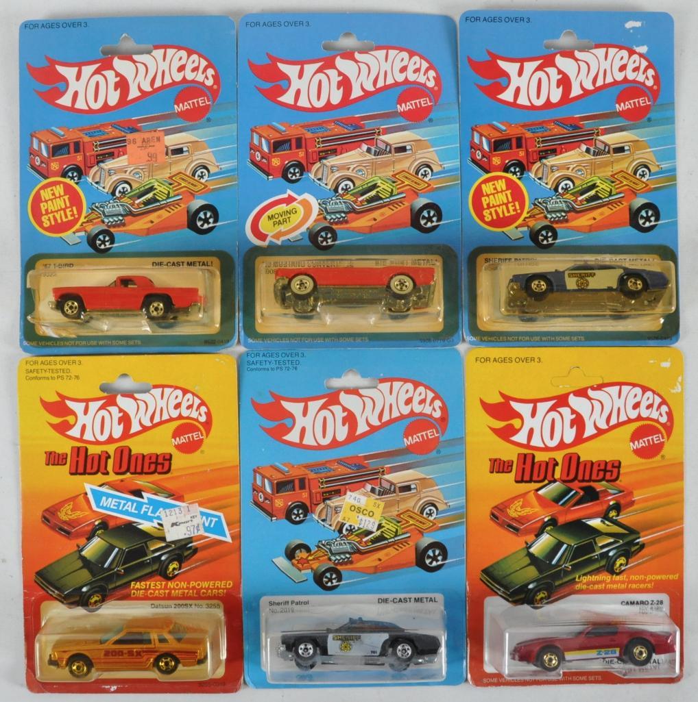 Group of 6 Hot Wheels Die-Cast Vehicles in Original: Includes Camaro Z-28, Sheriff Patrol, Datsun 200SX, '65 Mustang Convertible, and '57 T Bird, Some Damage to Packaging, New in Original Packaging