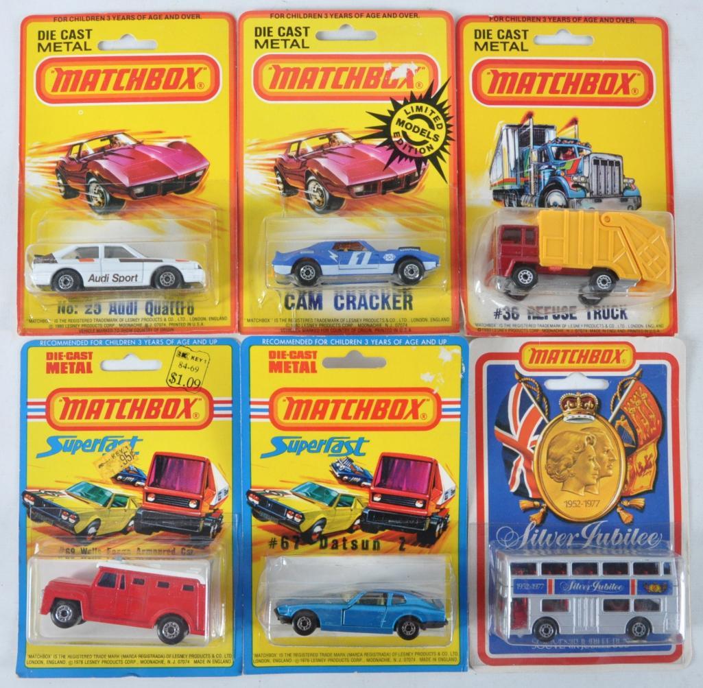 Group of 6 Matchbox Superfast Die-Cast Vehicles in: Includes No. 67 Datzun Z, No. 69 Wells Fargo Armored Car, No. 36 Refuse Truck, No. 23 Audi Quattro, Cam Cracker, and Silver Jubilee Bux, New in Original Packaging, A Lesney Product, Made in England