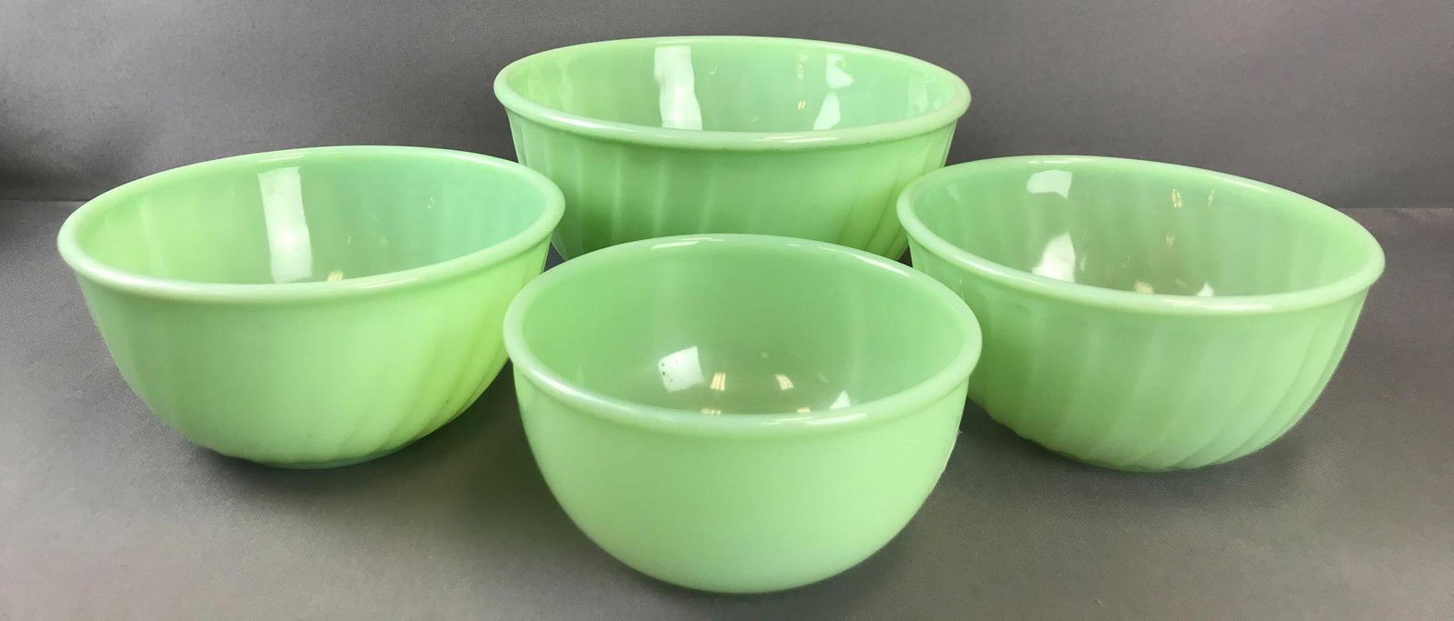 Group of 4 FireKing Jadeite mixing bowls: Largest is 9 inches
