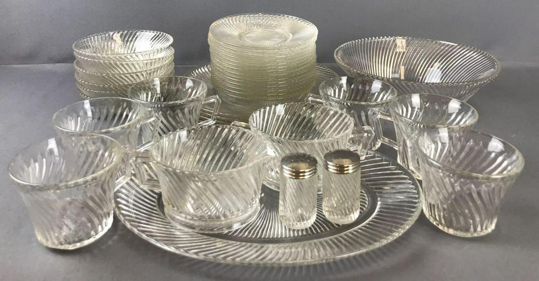 Group of 37 pieces clear glass swirl dinnerware: Platter-12 inches, dinner plates 9.5 inches