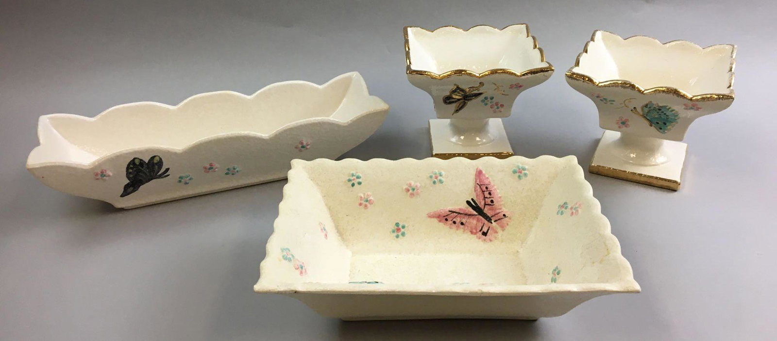 Group of 4 Vintage Hull Butterfly Pottery: Includes 2 B6 Pedestal candy dishes, B7 and B8, largest is 3 inches tall 13 inches long