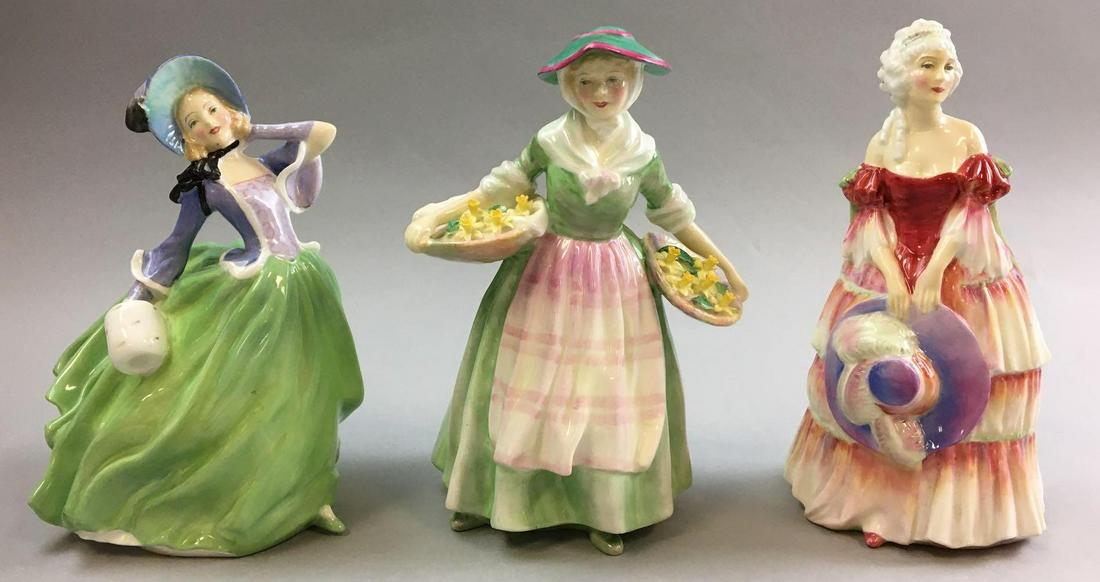 Group of 3 Royal Doulton Women Figurines: Includes autumn breezes, Veronica and daffy-down-dilly, largest is 8 inches tall