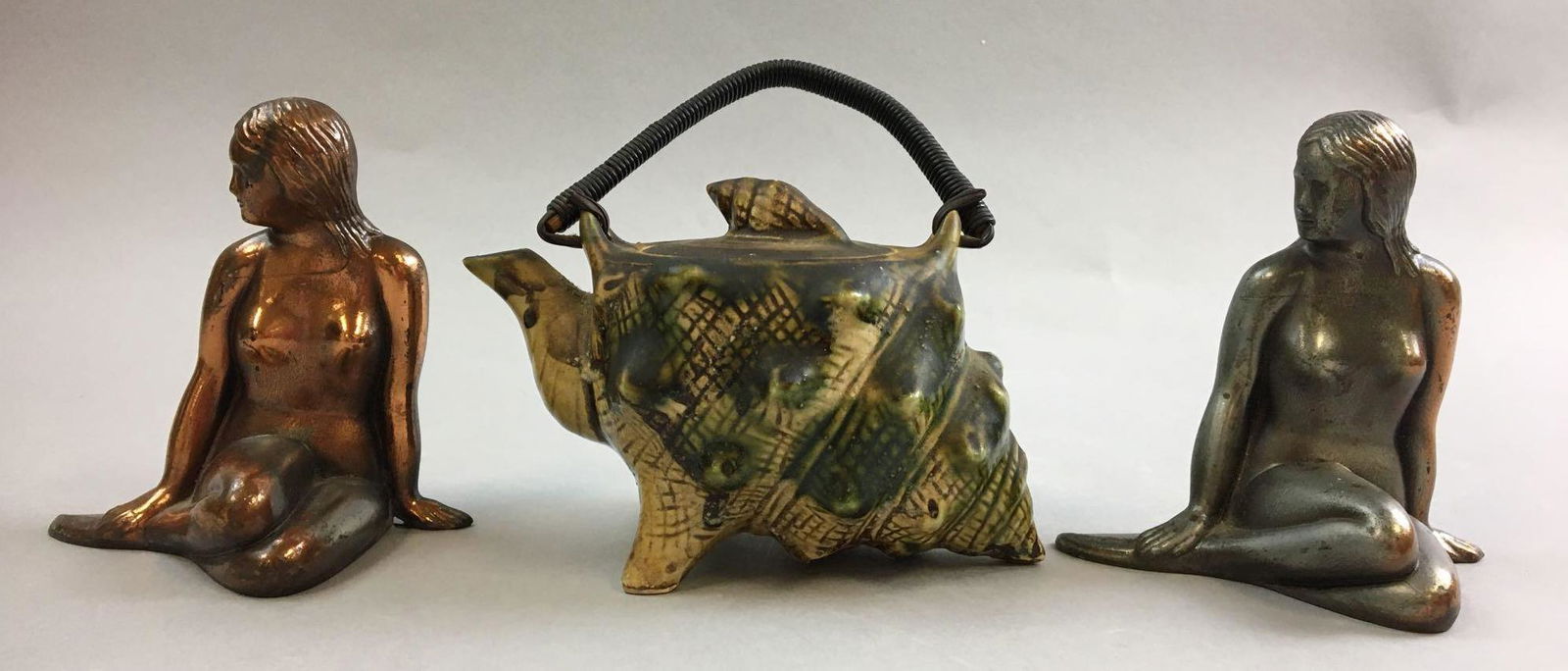 Group of 3 Mermaids and Shell Decor: Includes 2 metal mermaids and 1 teapot Shell, largest is 4 1/2 inches tall