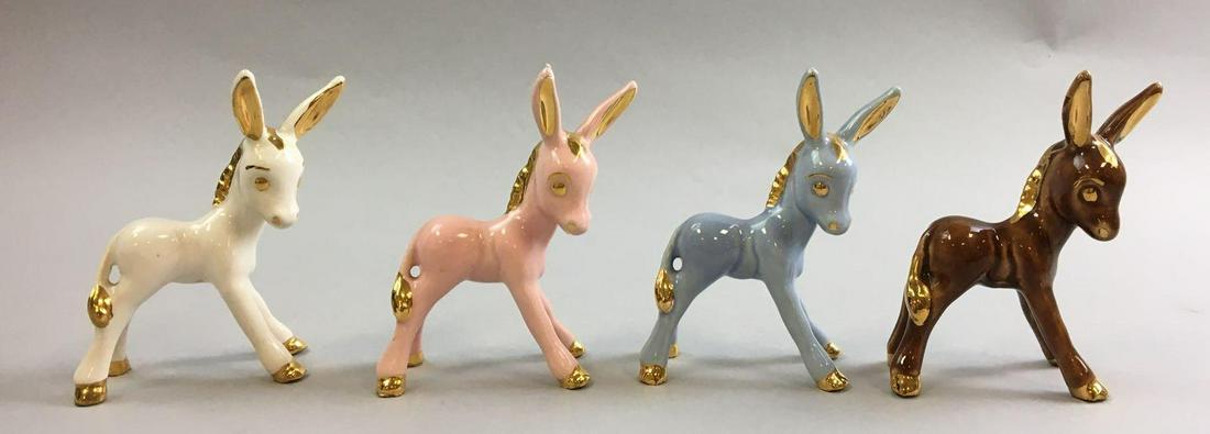 Group of 4 Gold Trim Donkey Figurines: White, pink, blue and brown, 3 1/2 x 5 inches