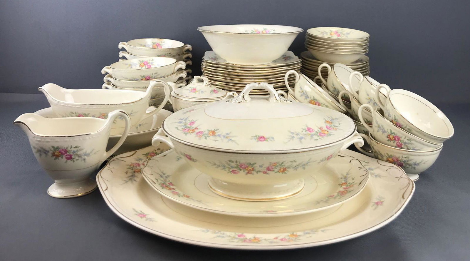 Group of 80+ pieces Homer Laughlin Eggshell Georgian: Largest is 16 inches.